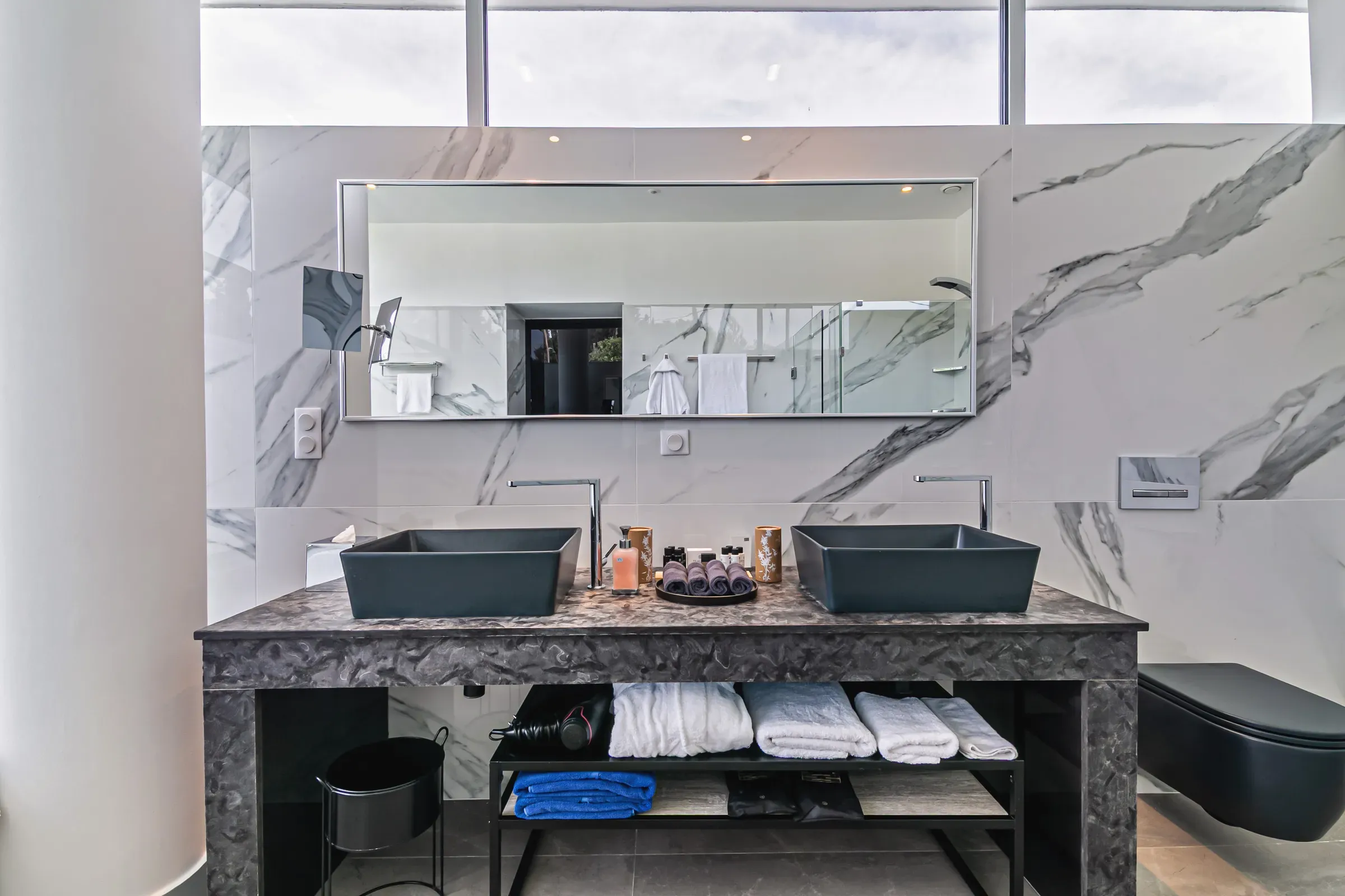 Marble bathroom with double vanity