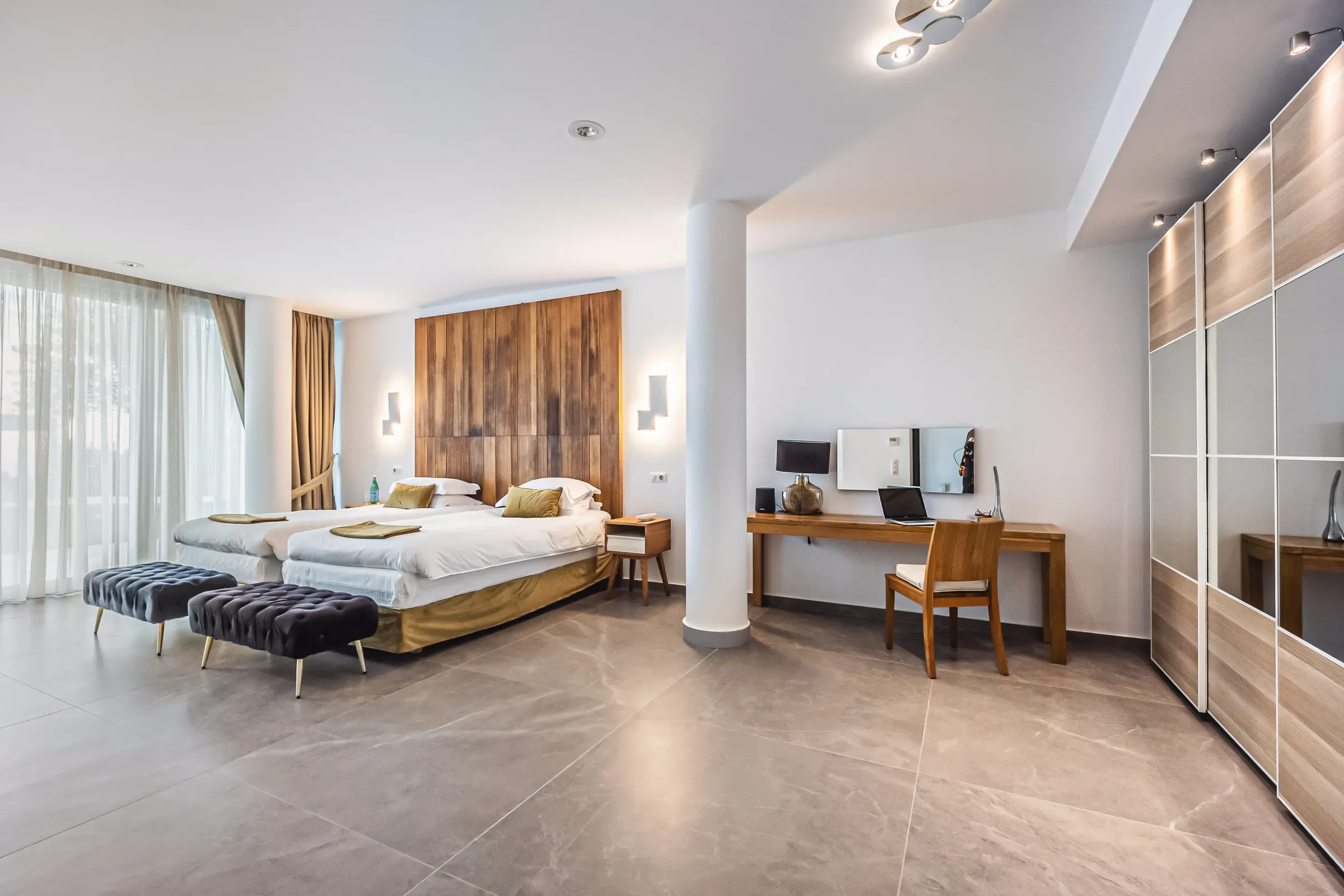 Bedroom with warm wood panelling